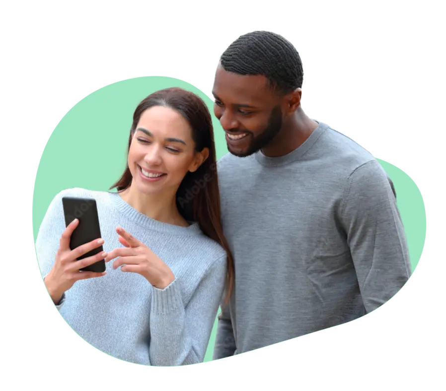 A happy couple using iVisa to apply for their trip