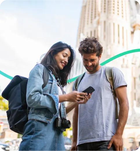 Two tourists looking at a phone